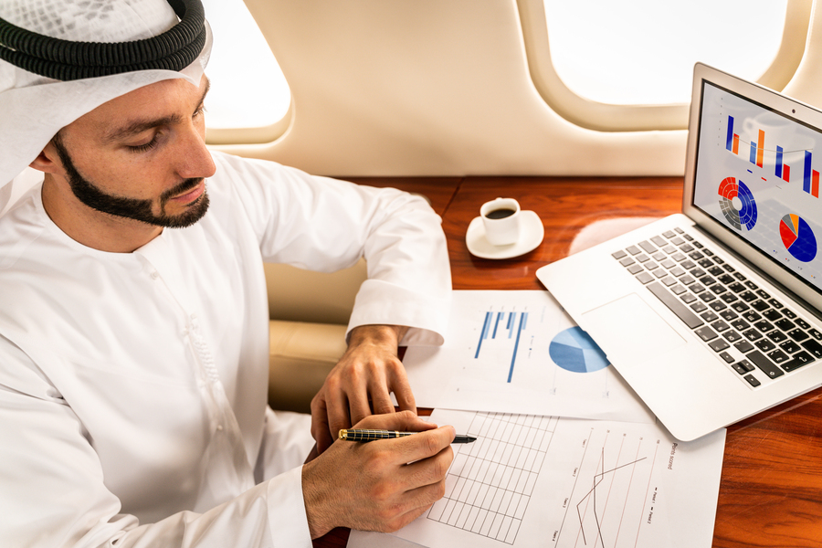 arabic businessman with traditional dress flies exclusive business class airplane 2 2
