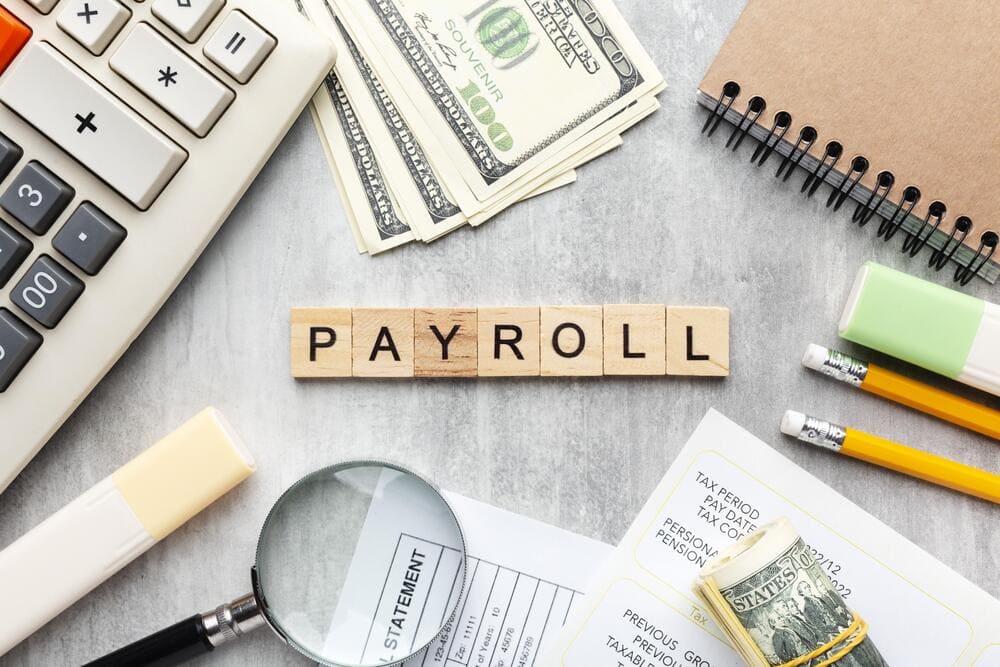 top view payroll concept with items 1 1 1
