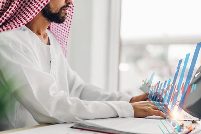 portrait arabic success arab businessman using technology laptop looking progress business financial investment data graph chart business growth increase office 1