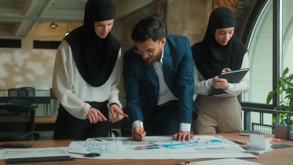 arabian man muslim women hijab business team colleagues architect engineer designer drawing 1